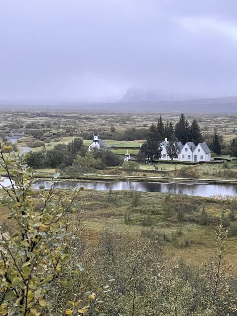 Old-buildings-in-distance-gloomy-day-in-Thingvellir-national-park-historic-site-of-Althing-first-democratic-parliment-in-the-world