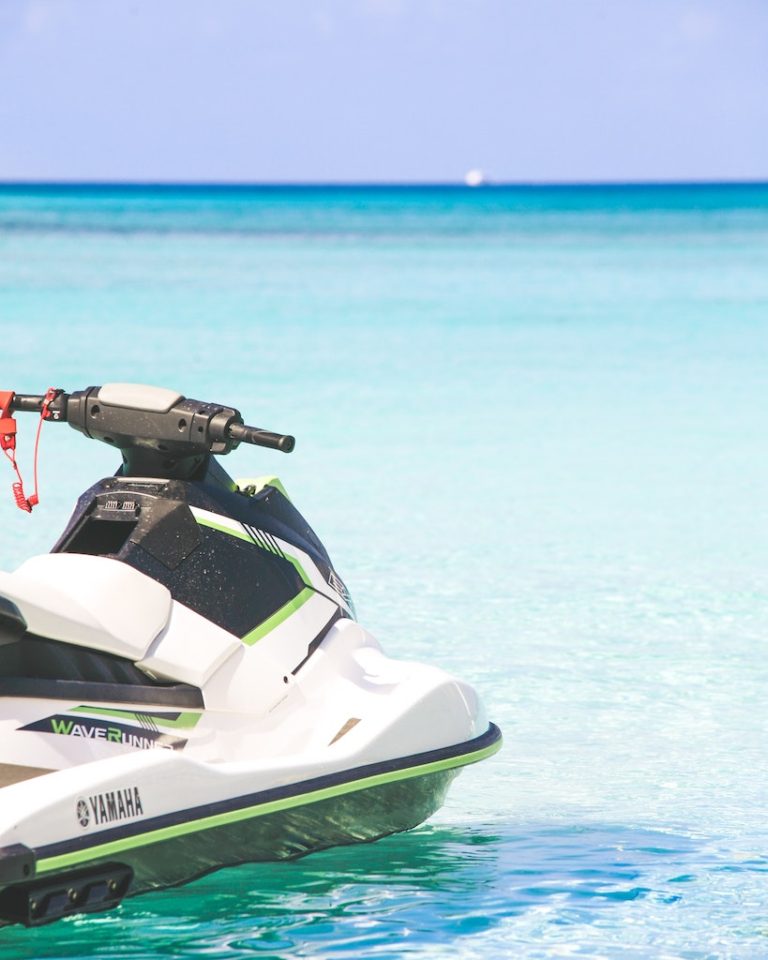 Jetski on clear blue water.