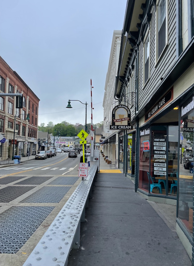 Charming downtown area lined with shops, ice cream parlors, and restaurants. Mystic, Connecticut.
