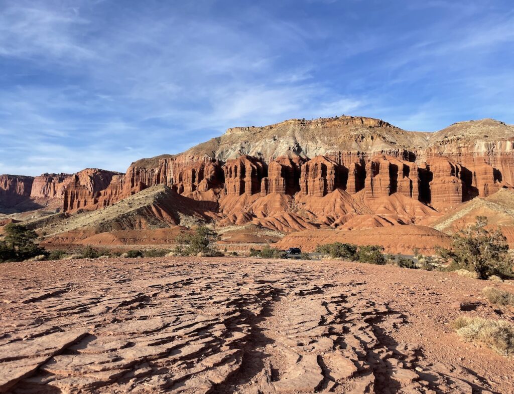 Red Rock mountain plateau surrounded by desert landscape on sunny winter day. Capitol Reef National Park, Utah.