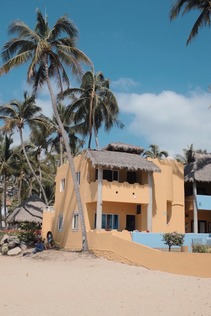 colorful beach home palm trees sayulita