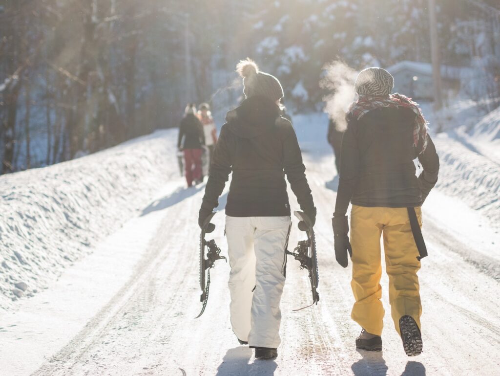 snowshoeing women winter snow wyoming