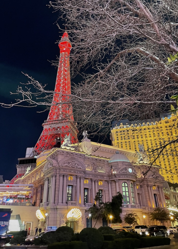 paris las vegas hotel eiffel tower lit at night las vegas strip nevada 1