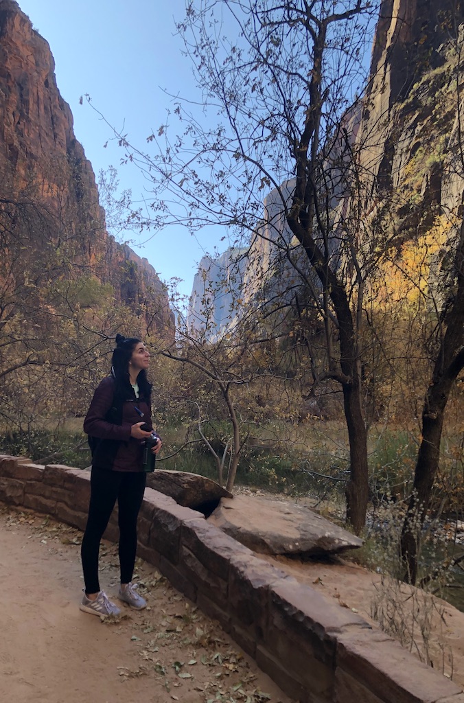 woman hiking riverwalk trail fall zion national park utah