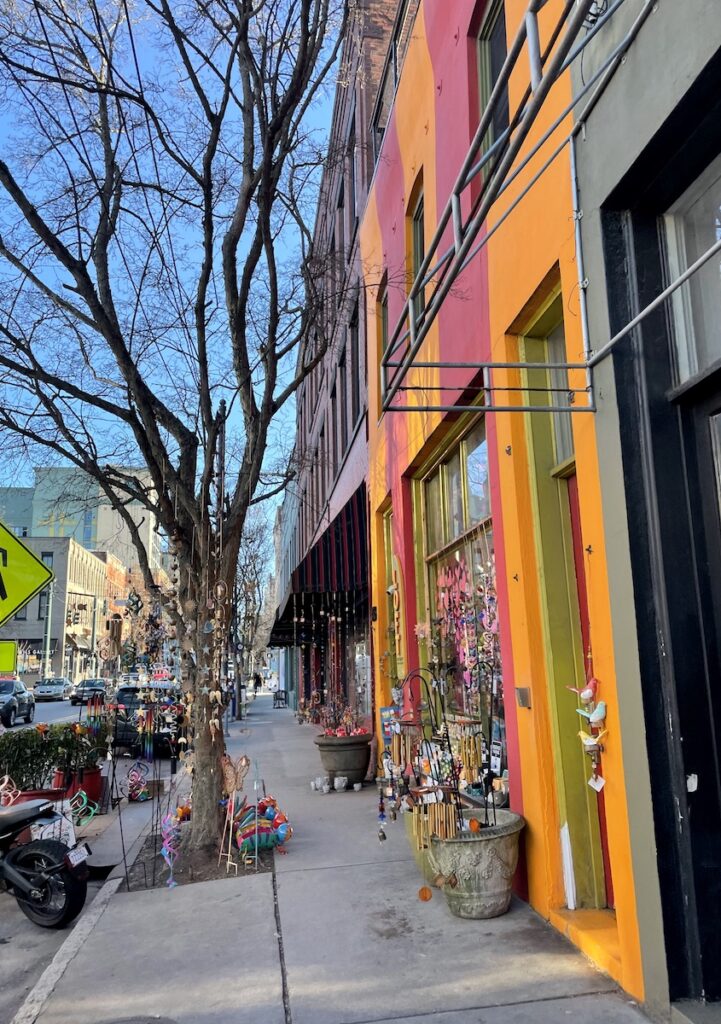 Line of colorful buildings on main street on sunny winter day. Downtown Asheville, North Carolina.