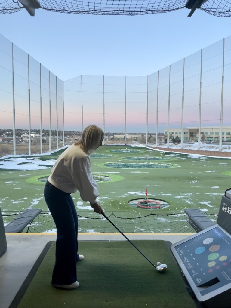 topgolf winter woman golfing
