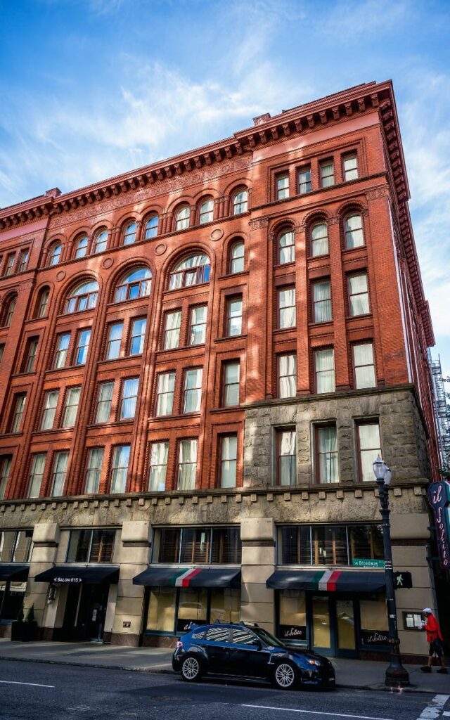 Brick building in downtown area on sunny day. Imperial Hotel, downtown Portland, Oregon.