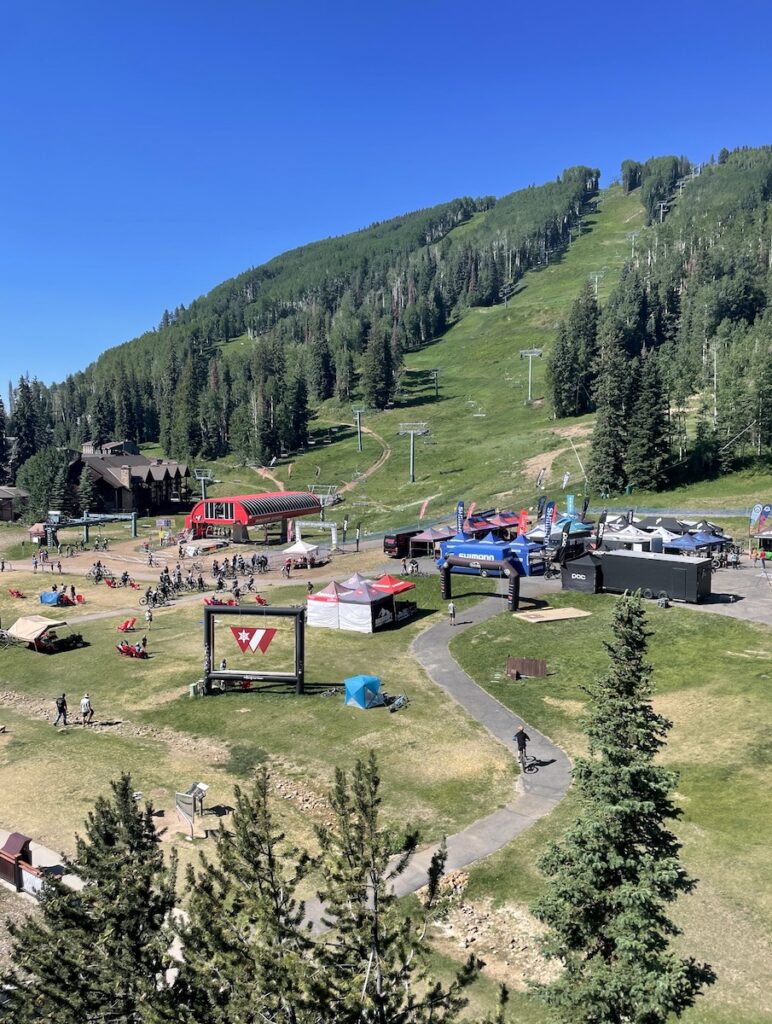 View of mountain biking trails and ski lifts during summer on sunny day. Purgatory Village, Purgatory Ski Resort, Durango, Colorado.