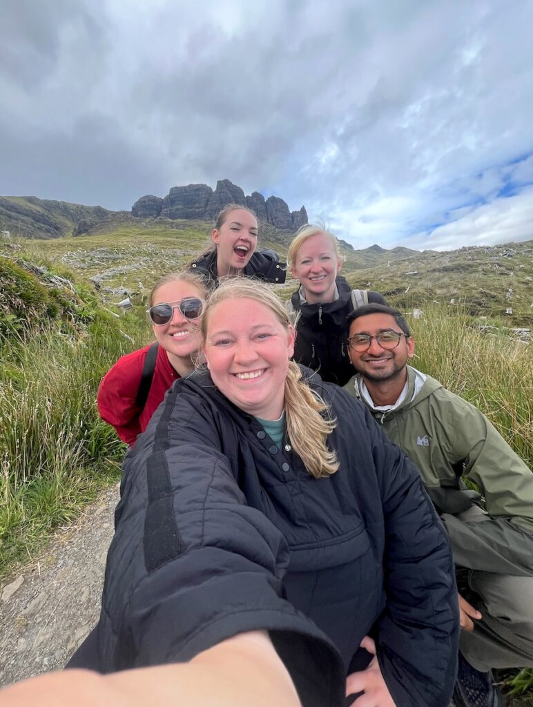 Group of friends hiking Old Man of Storr Portree Scotland
