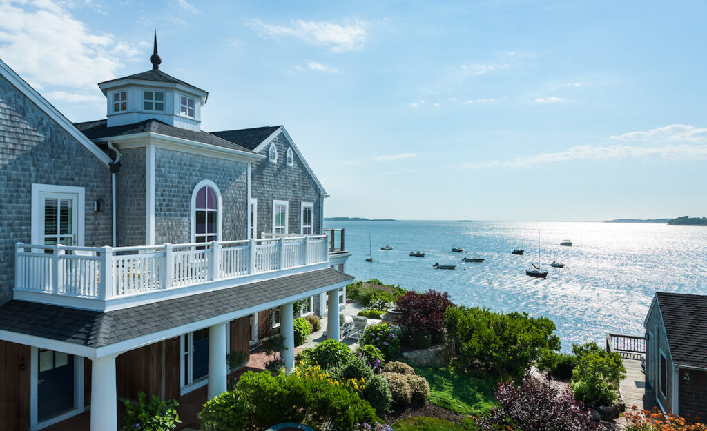 Historic hotel overlooking the water on sunny summer day. Wequassett Resort & Golf Club, Harwich, Cape Cod, Massachusetts.