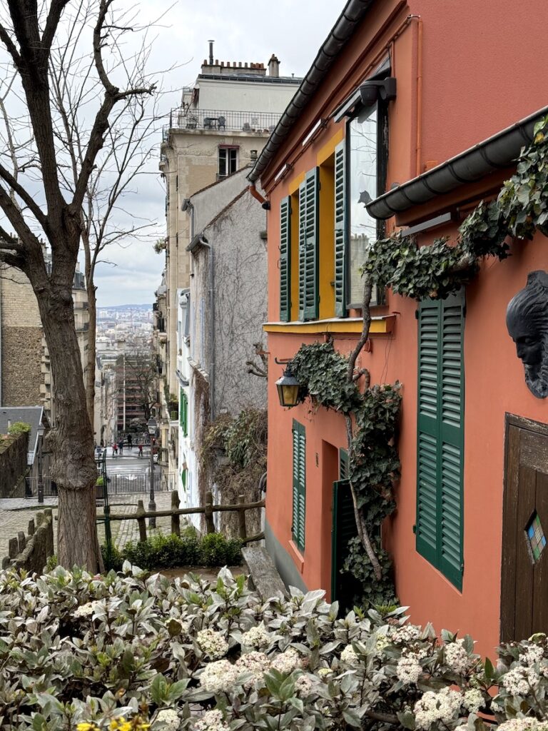 colorful house and flowers in Montmartre Paris France