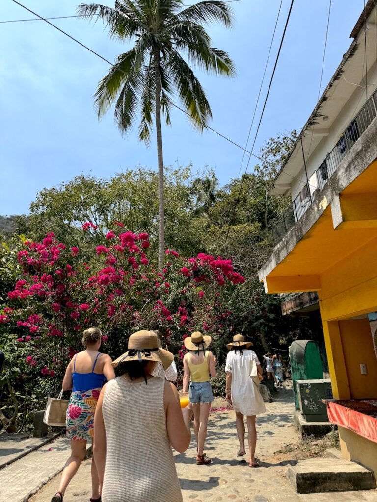 women walking on cobblestone streets yelapa mexico