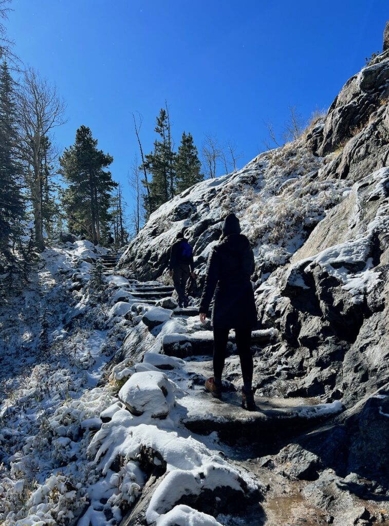 fall hike rocky mountain national park colorado snowy trail dream and emerald lake