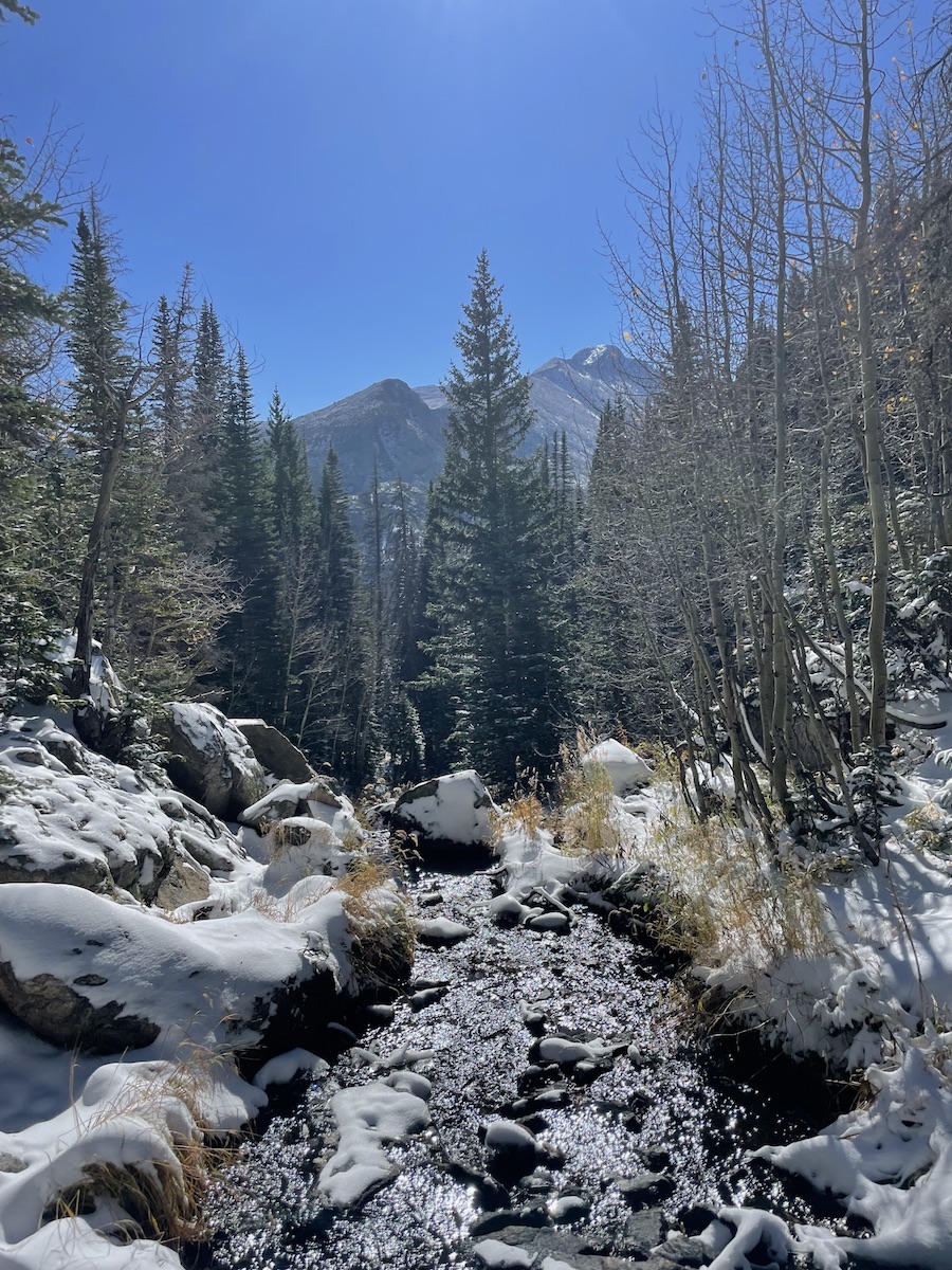 snowy stream sunny fall day rocky mountain national park colorado