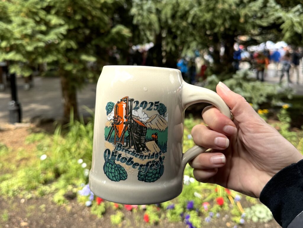 holding a stein at Breckenridge Oktoberfest colorado