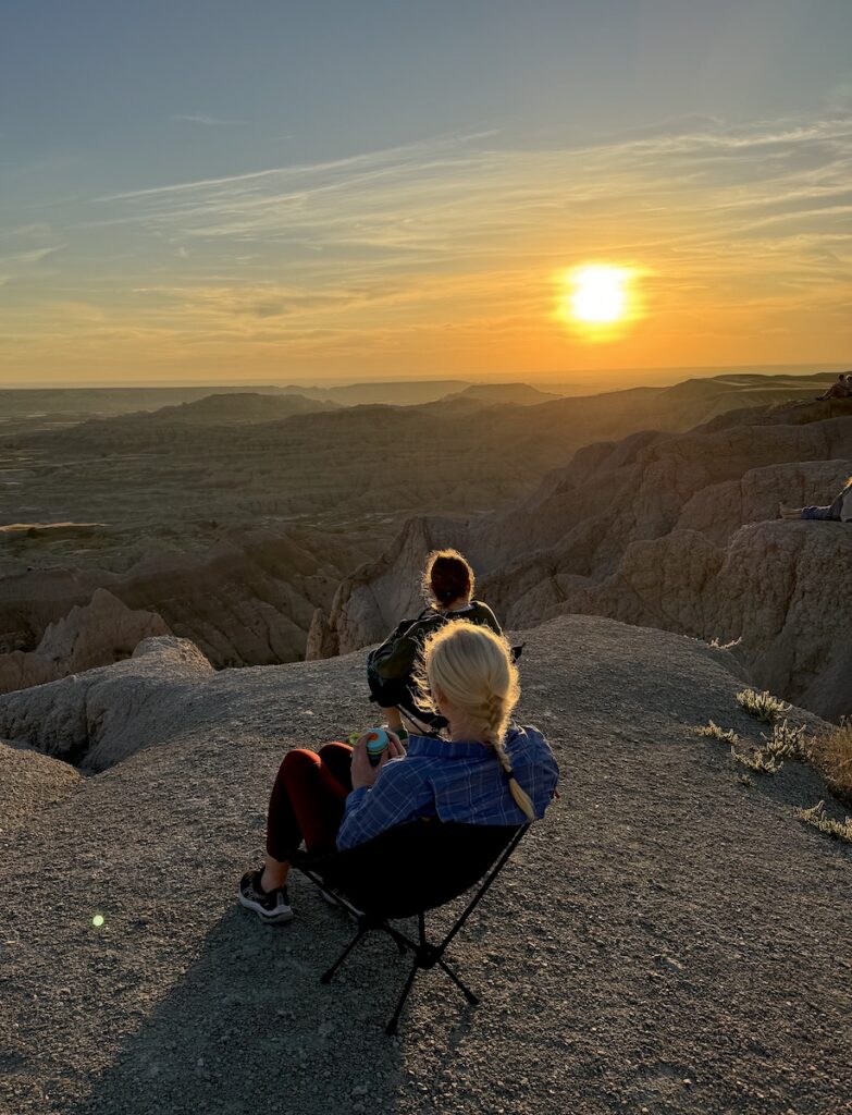 watching sunset pinnacles overlook badlands national park south dakota
