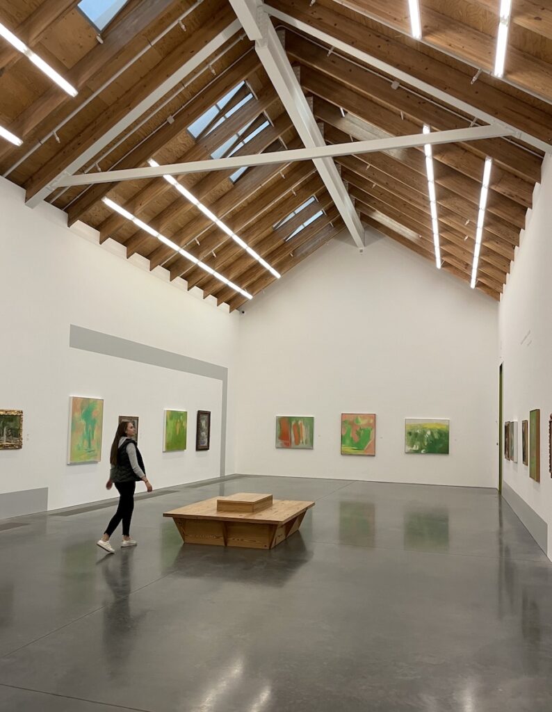woman browsing art gallery modern building Parrish Art Museum southampton water mill new york the hamptons