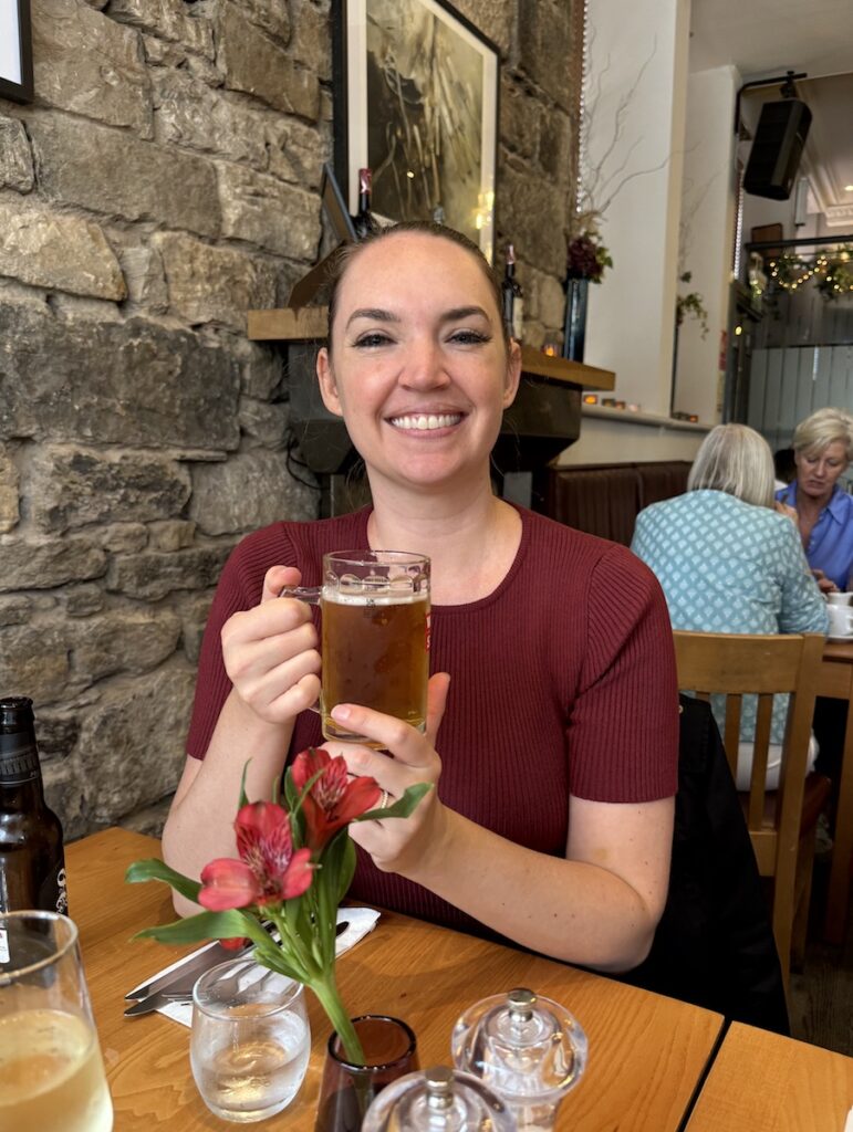 woman with beer at red onion Glasgow Scotland United Kingdom