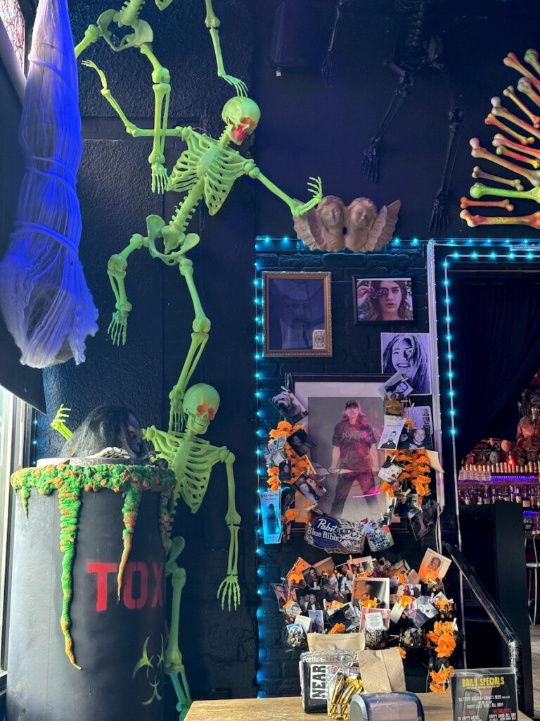the crypt bar denver skelaton decor