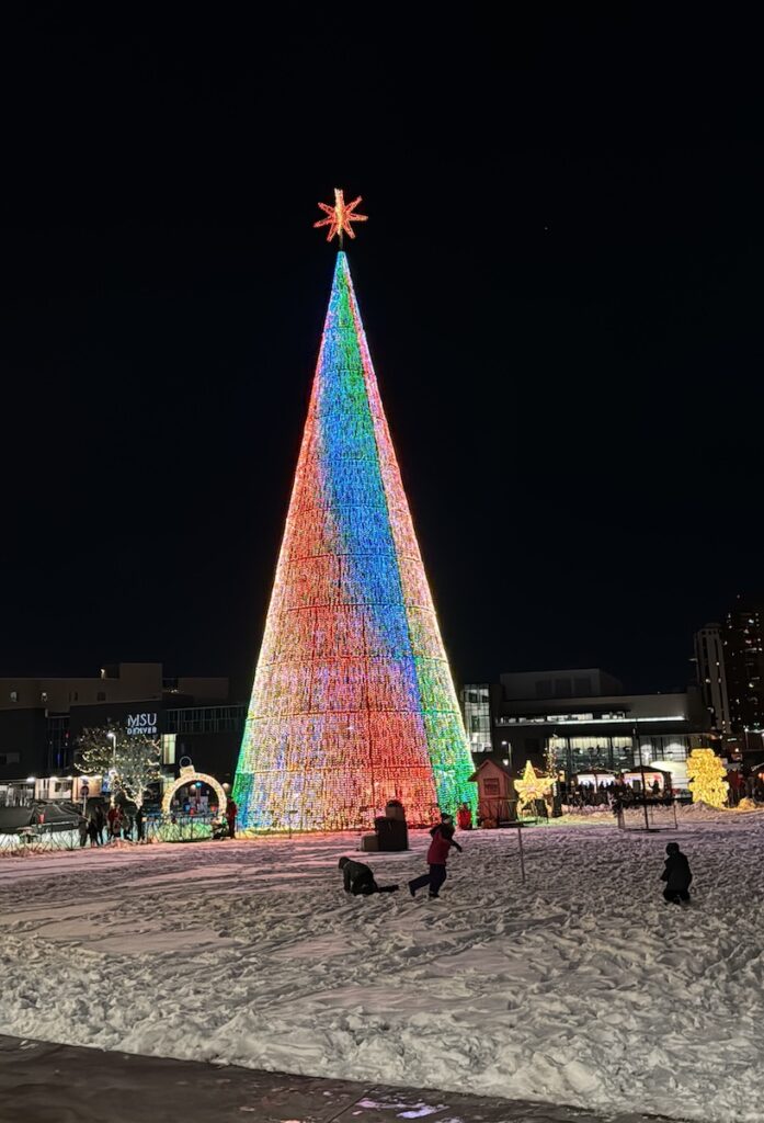 Denver Christkindlmarket mile high tree on snowy night colorado