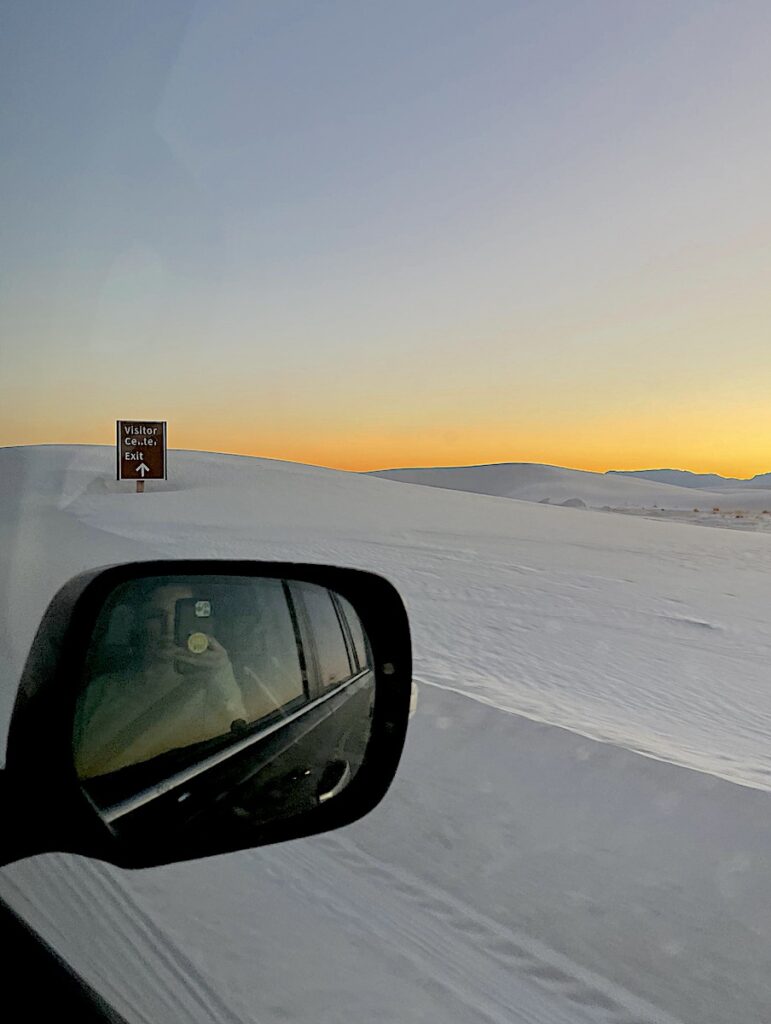 driving through sand dunes on dunes drive loop at sunset white sands national park new mexico