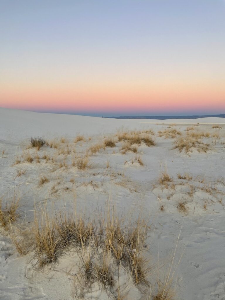pink colorful sunset over white sand dunes white sands national park new mexico