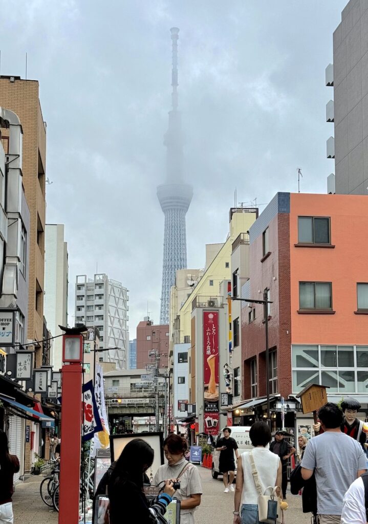 tokyo tower views from Nakamise dori market at Senso ji Temple tokyo japan