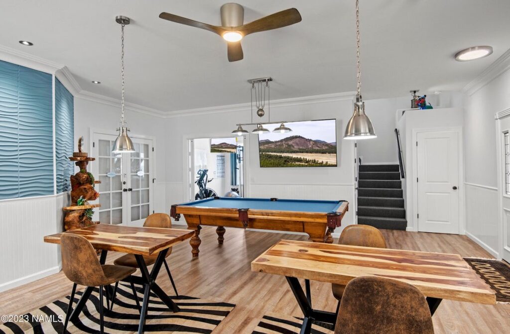 Hotel guest area with seating and desk areas and pool table. 303 BnB Inn, Flagstaff, Arizona.